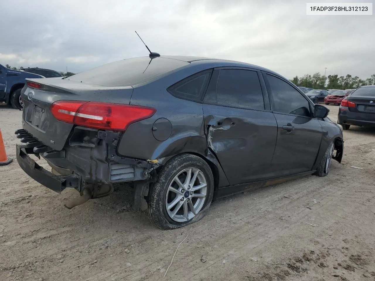 2017 Ford Focus Se VIN: 1FADP3F28HL312123 Lot: 79941054