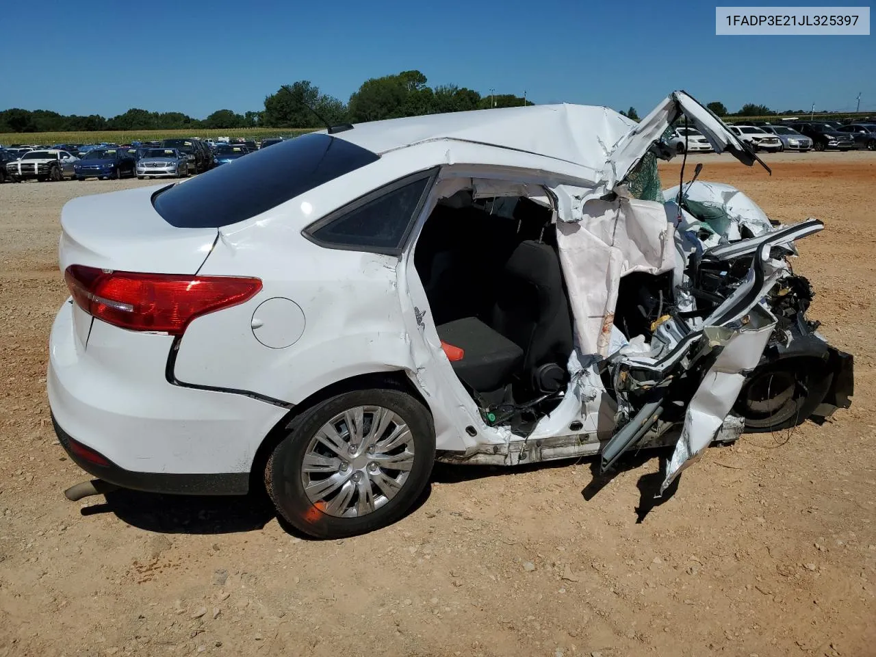 2018 Ford Focus S VIN: 1FADP3E21JL325397 Lot: 61058424