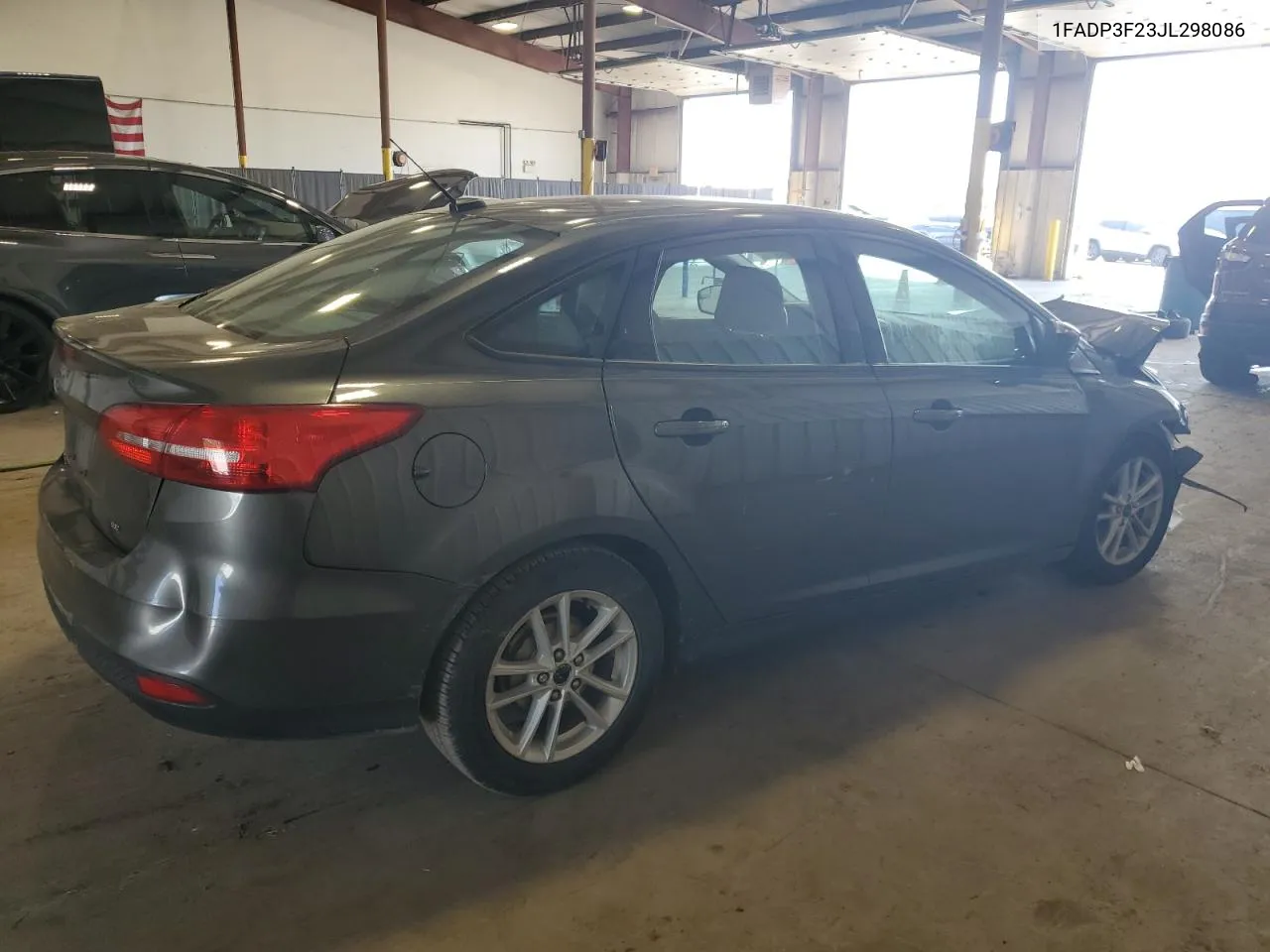 2018 Ford Focus Se VIN: 1FADP3F23JL298086 Lot: 69005374