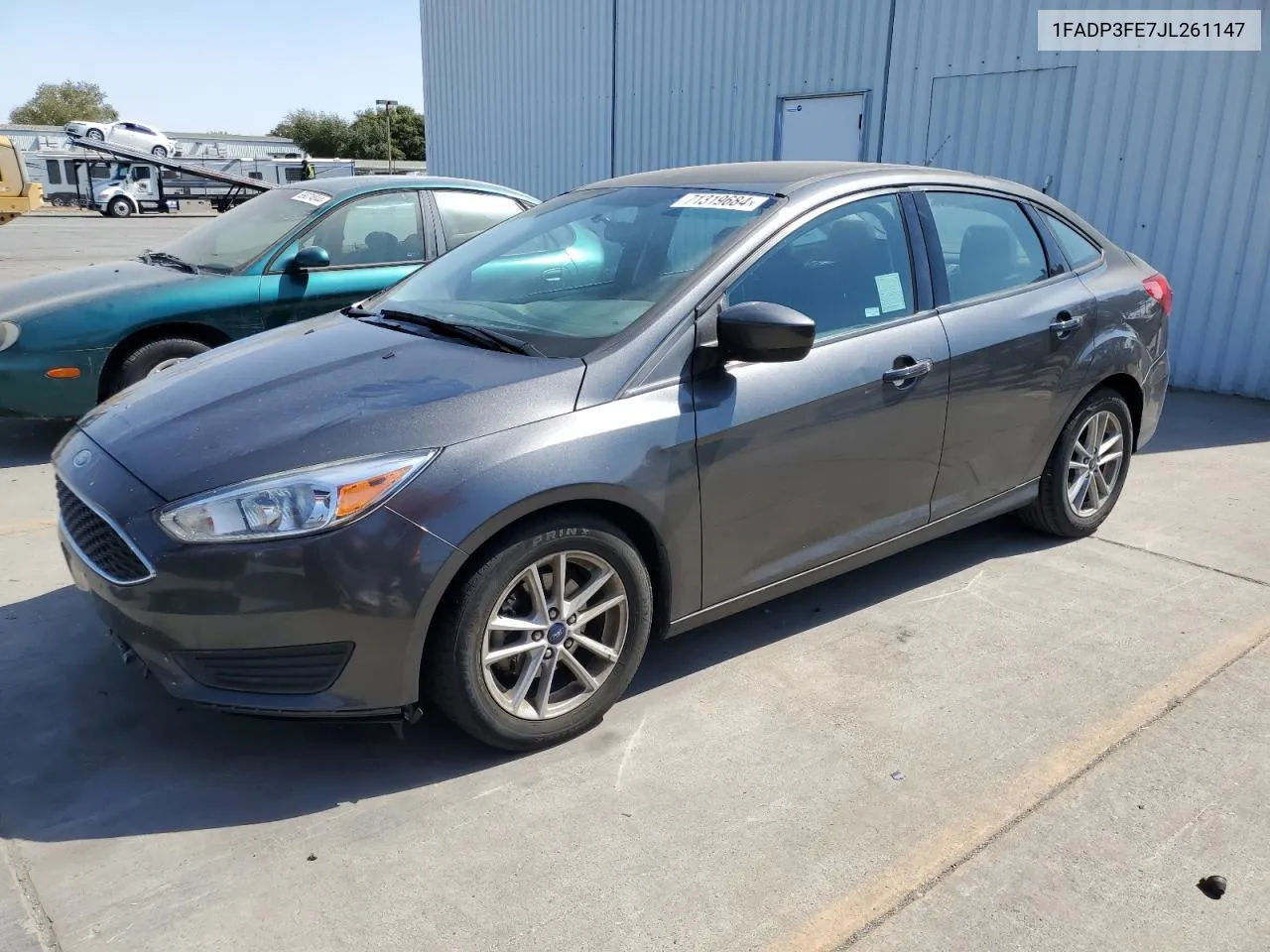 2018 Ford Focus Se VIN: 1FADP3FE7JL261147 Lot: 71319684