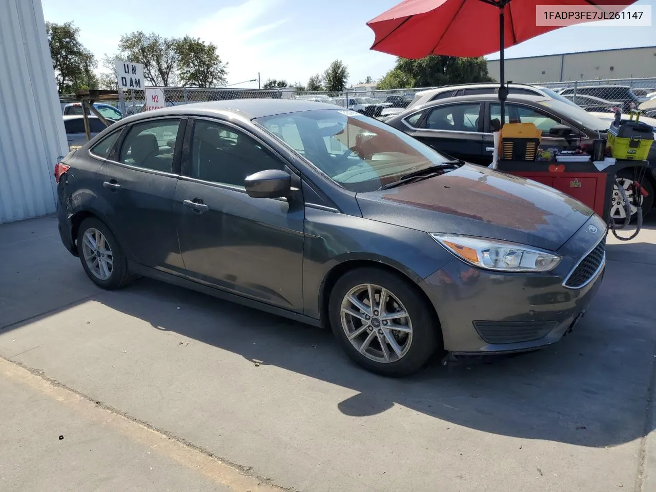 2018 Ford Focus Se VIN: 1FADP3FE7JL261147 Lot: 71319684