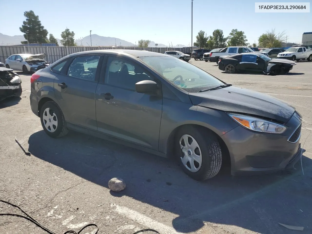 2018 Ford Focus S VIN: 1FADP3E23JL290684 Lot: 72672094