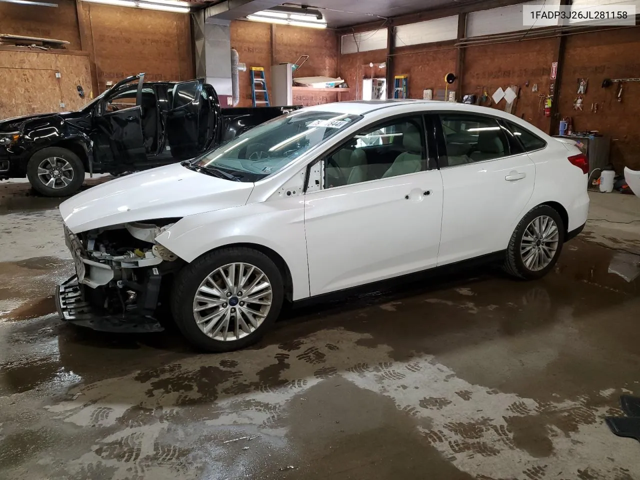 2018 Ford Focus Titanium VIN: 1FADP3J26JL281158 Lot: 79037844