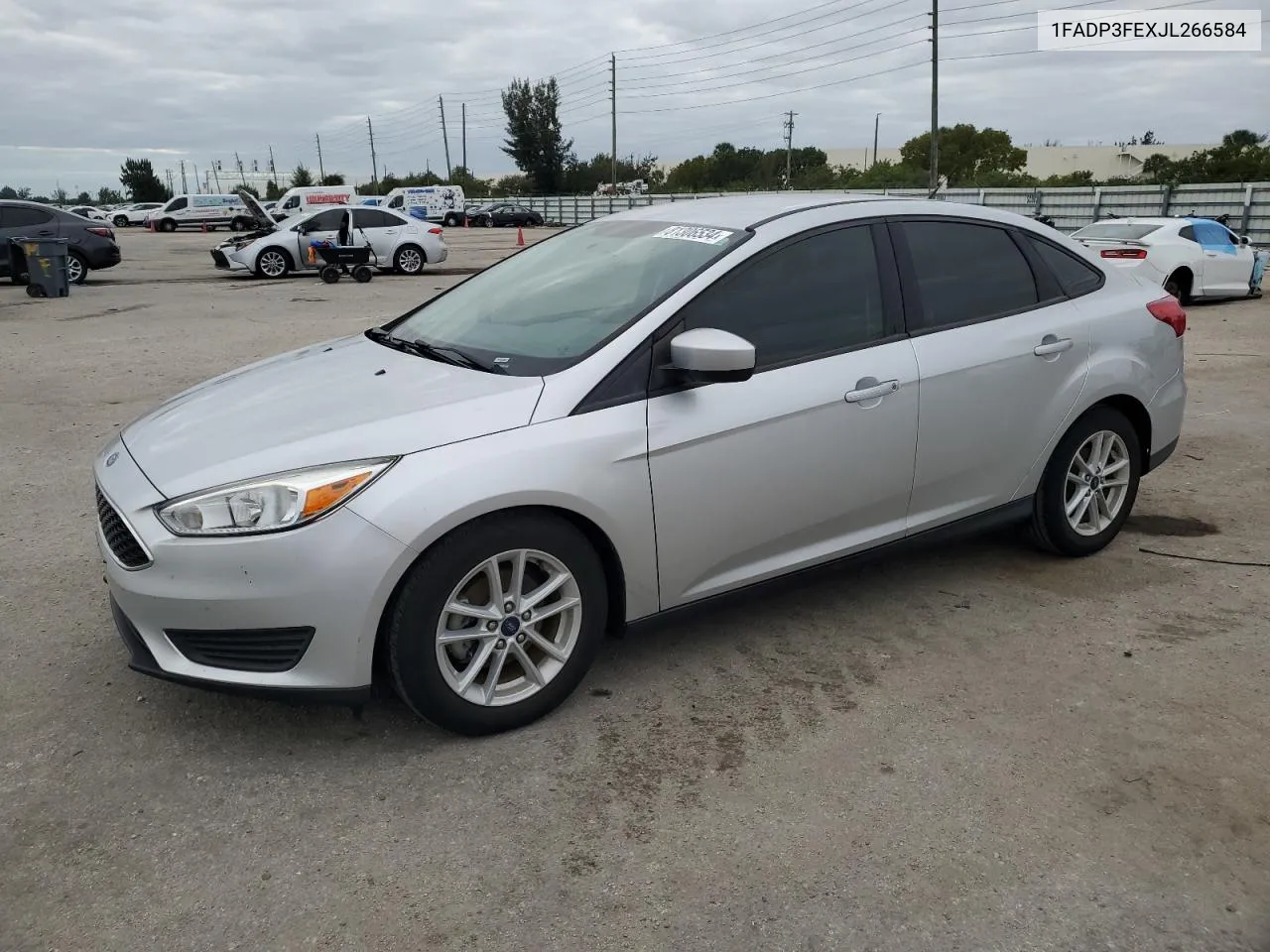 2018 Ford Focus Se VIN: 1FADP3FEXJL266584 Lot: 81306534