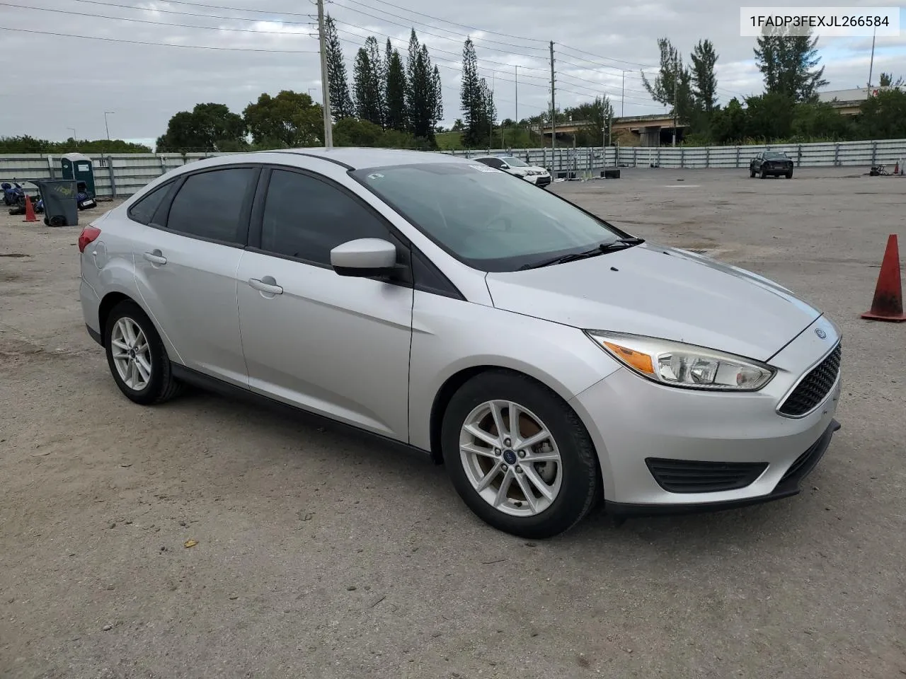 2018 Ford Focus Se VIN: 1FADP3FEXJL266584 Lot: 81306534