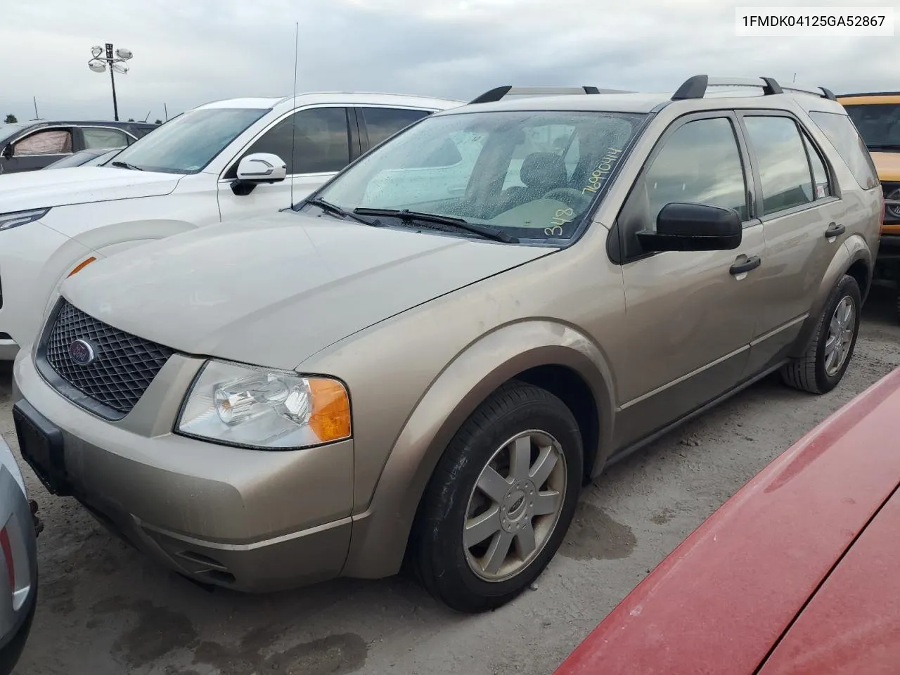 2005 Ford Freestyle Se VIN: 1FMDK04125GA52867 Lot: 76990414