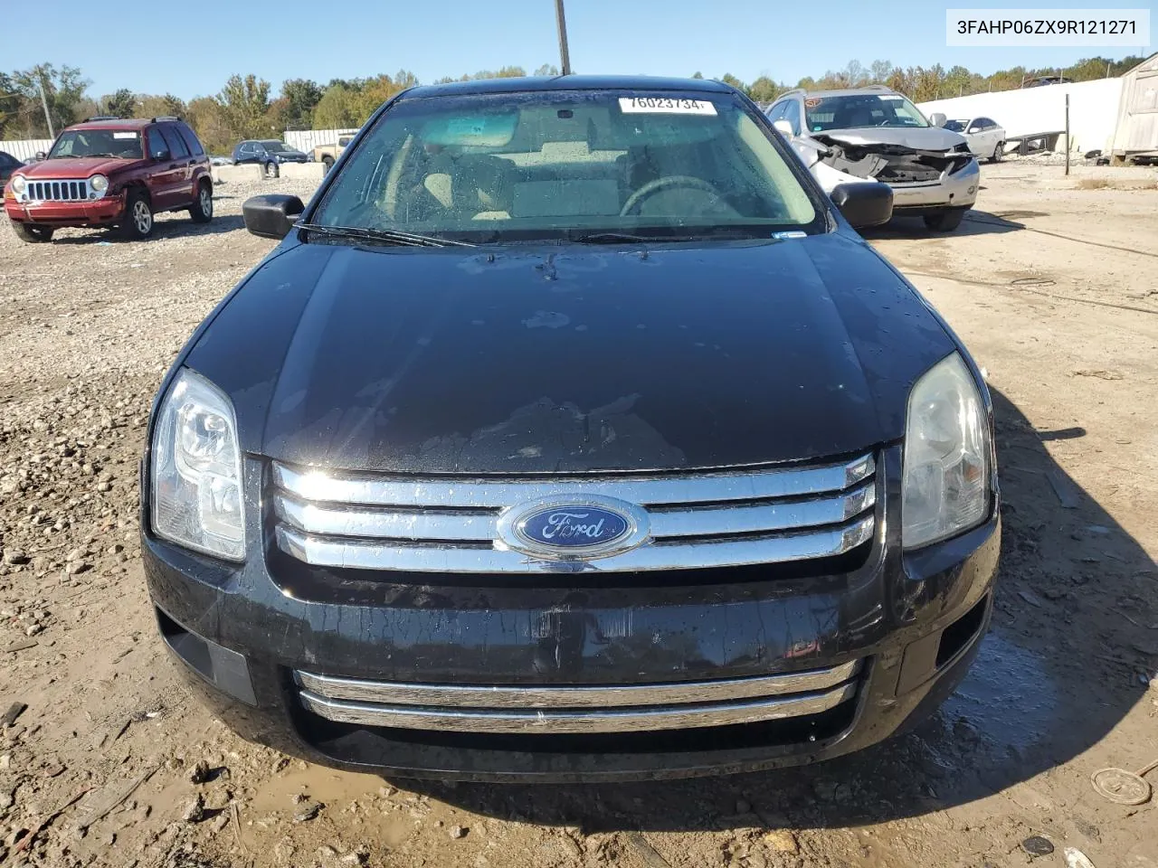 2009 Ford Fusion S VIN: 3FAHP06ZX9R121271 Lot: 76023734