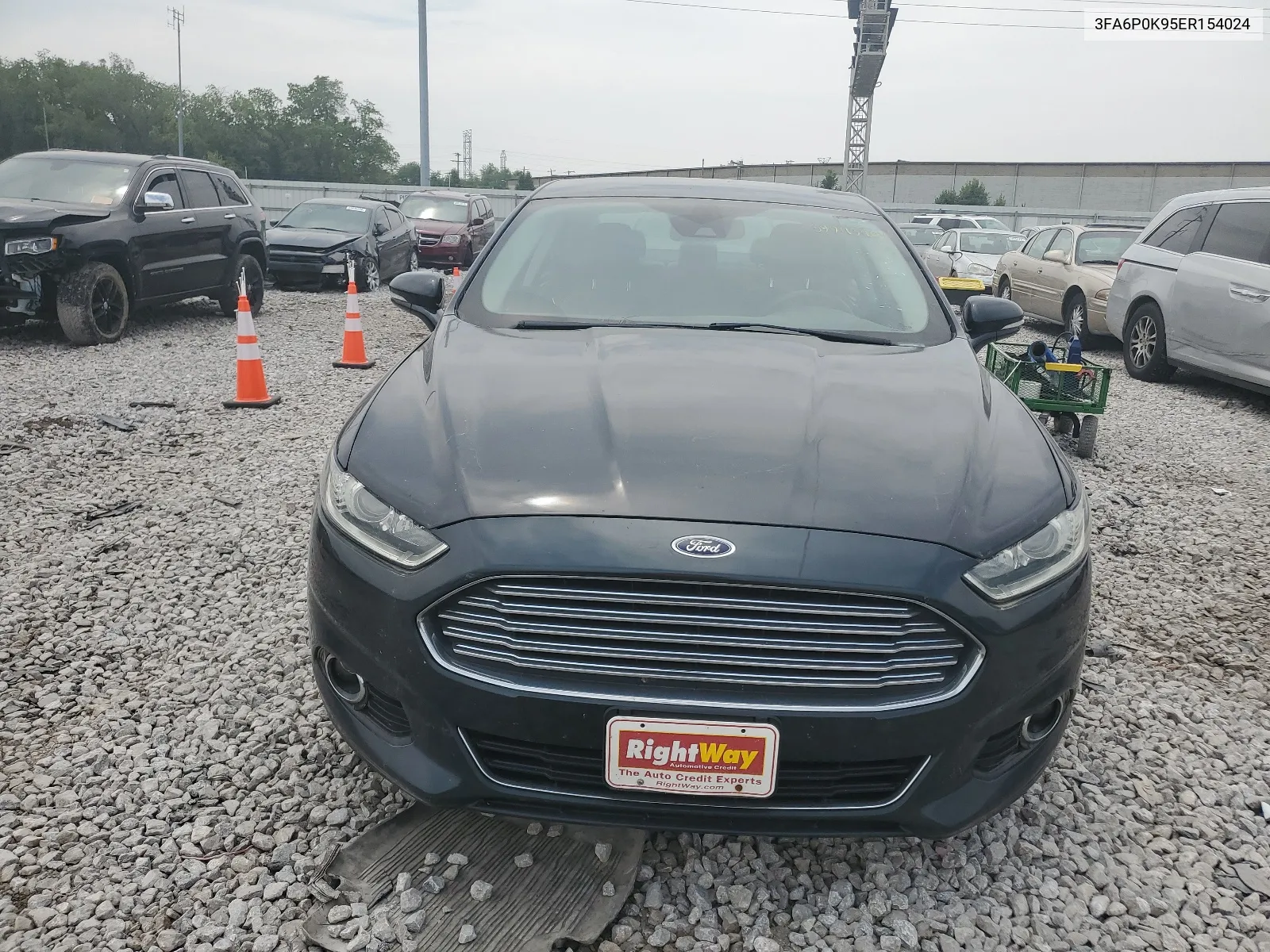 2014 Ford Fusion Titanium VIN: 3FA6P0K95ER154024 Lot: 59943404