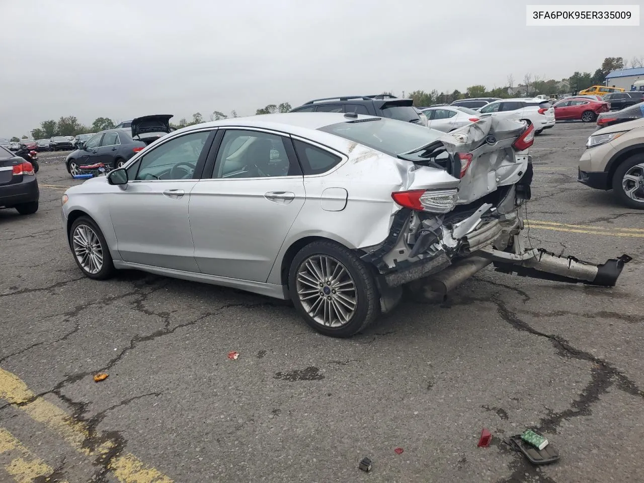 2014 Ford Fusion Titanium VIN: 3FA6P0K95ER335009 Lot: 73255494