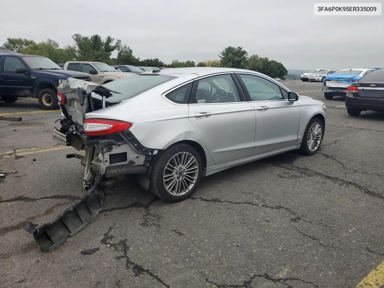 2014 Ford Fusion Titanium VIN: 3FA6P0K95ER335009 Lot: 73255494