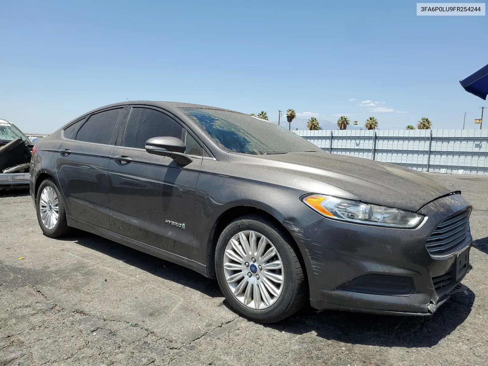 2015 Ford Fusion Se Hybrid VIN: 3FA6P0LU9FR254244 Lot: 66330194