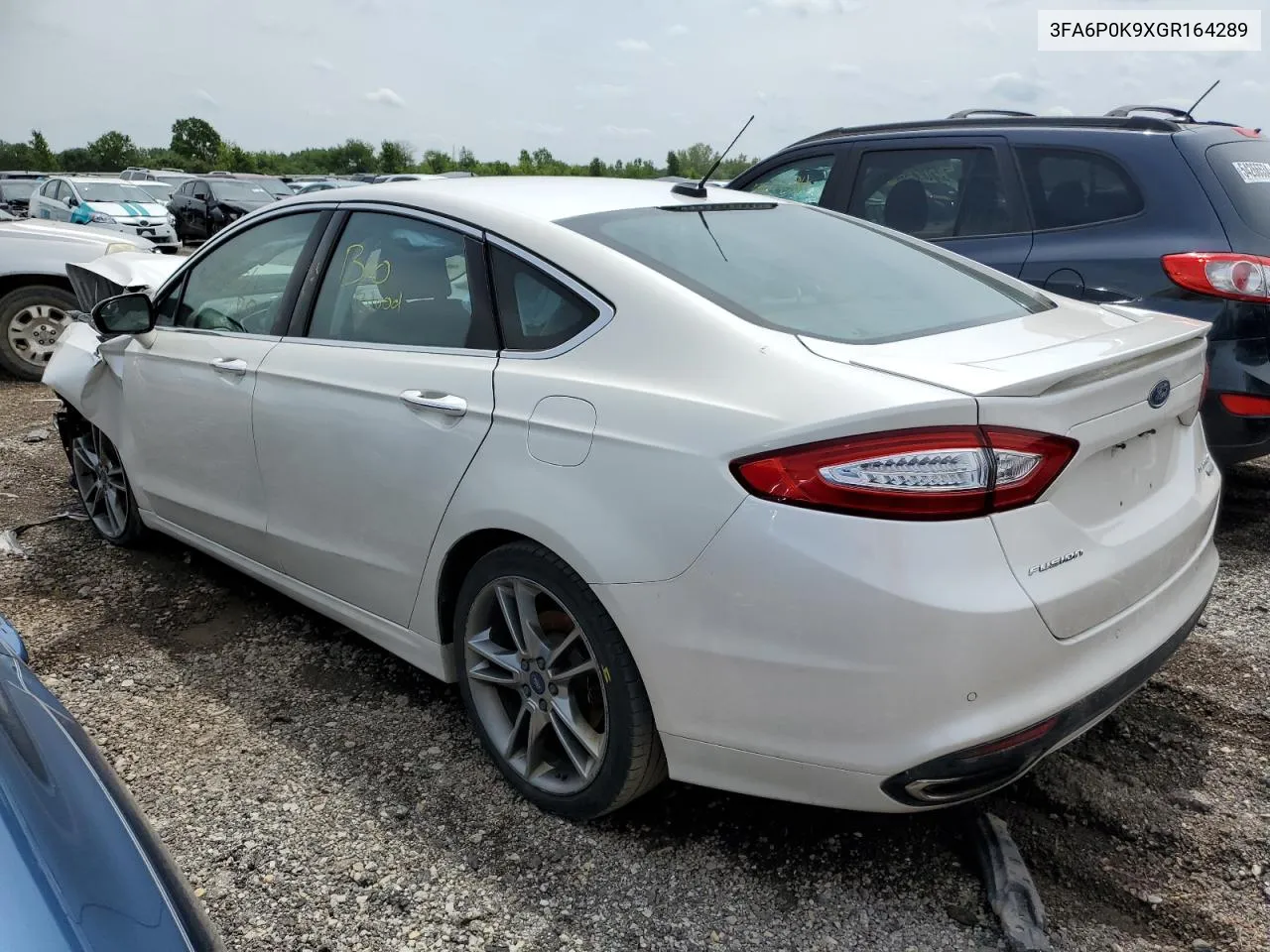 2016 Ford Fusion Titanium VIN: 3FA6P0K9XGR164289 Lot: 56736534