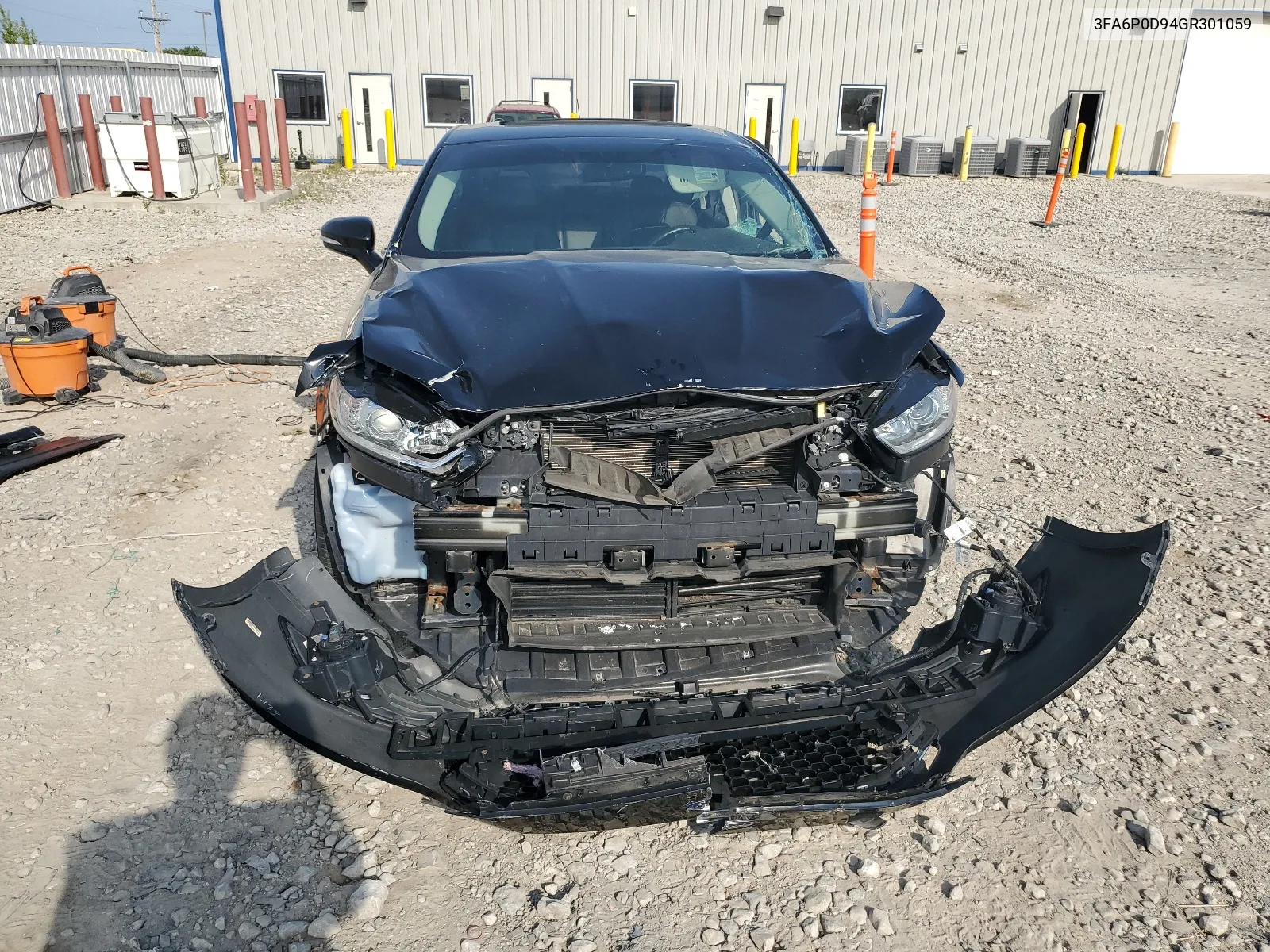 2016 Ford Fusion Titanium VIN: 3FA6P0D94GR301059 Lot: 68837444