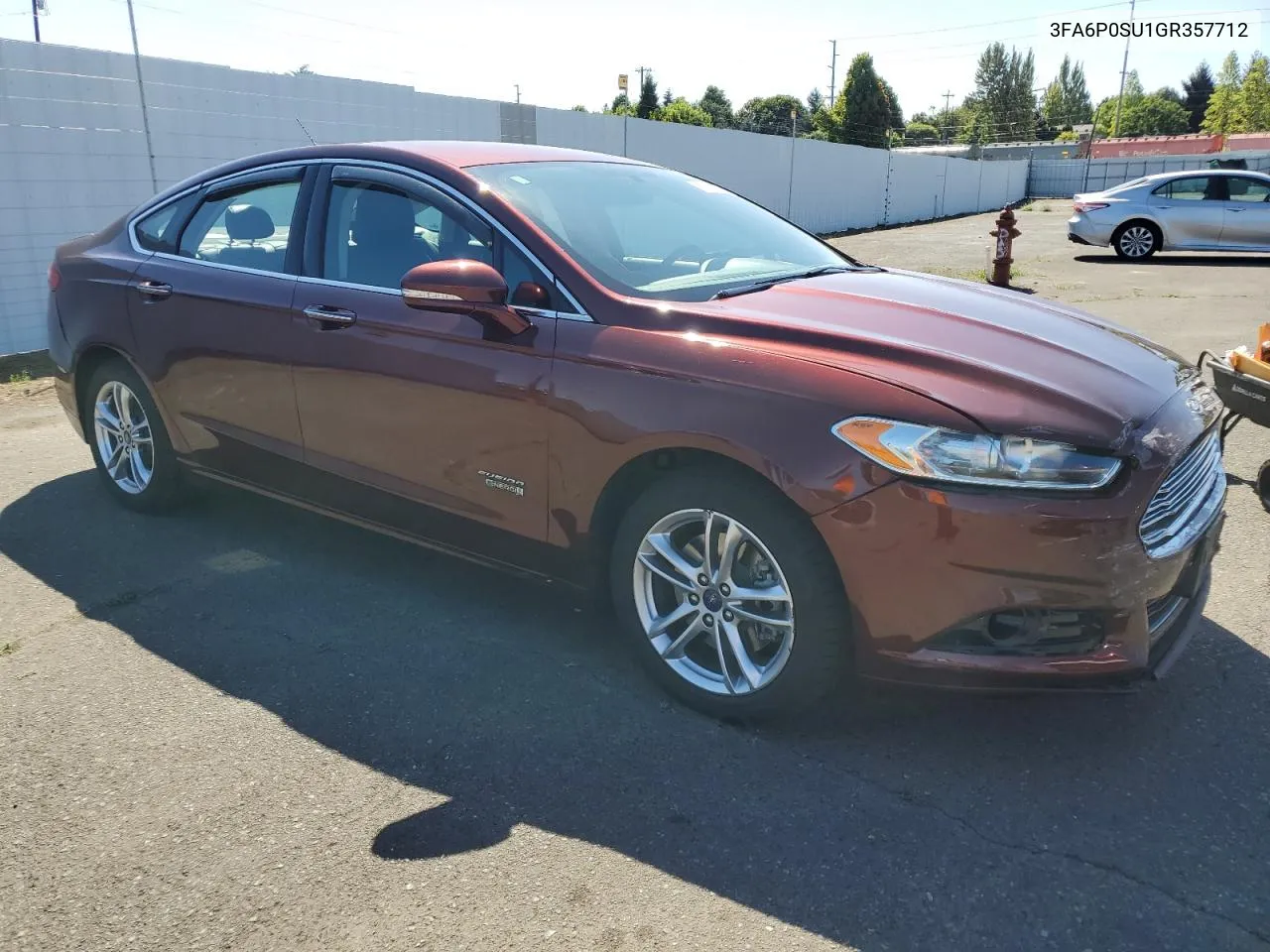 2016 Ford Fusion Titanium Phev VIN: 3FA6P0SU1GR357712 Lot: 69103854