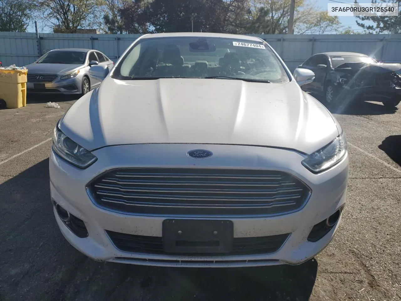 2016 Ford Fusion Titanium Hev VIN: 3FA6P0RU3GR125540 Lot: 74677404