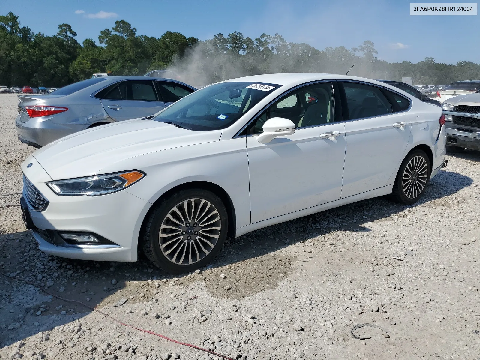 2017 Ford Fusion Titanium VIN: 3FA6P0K98HR124004 Lot: 58225554