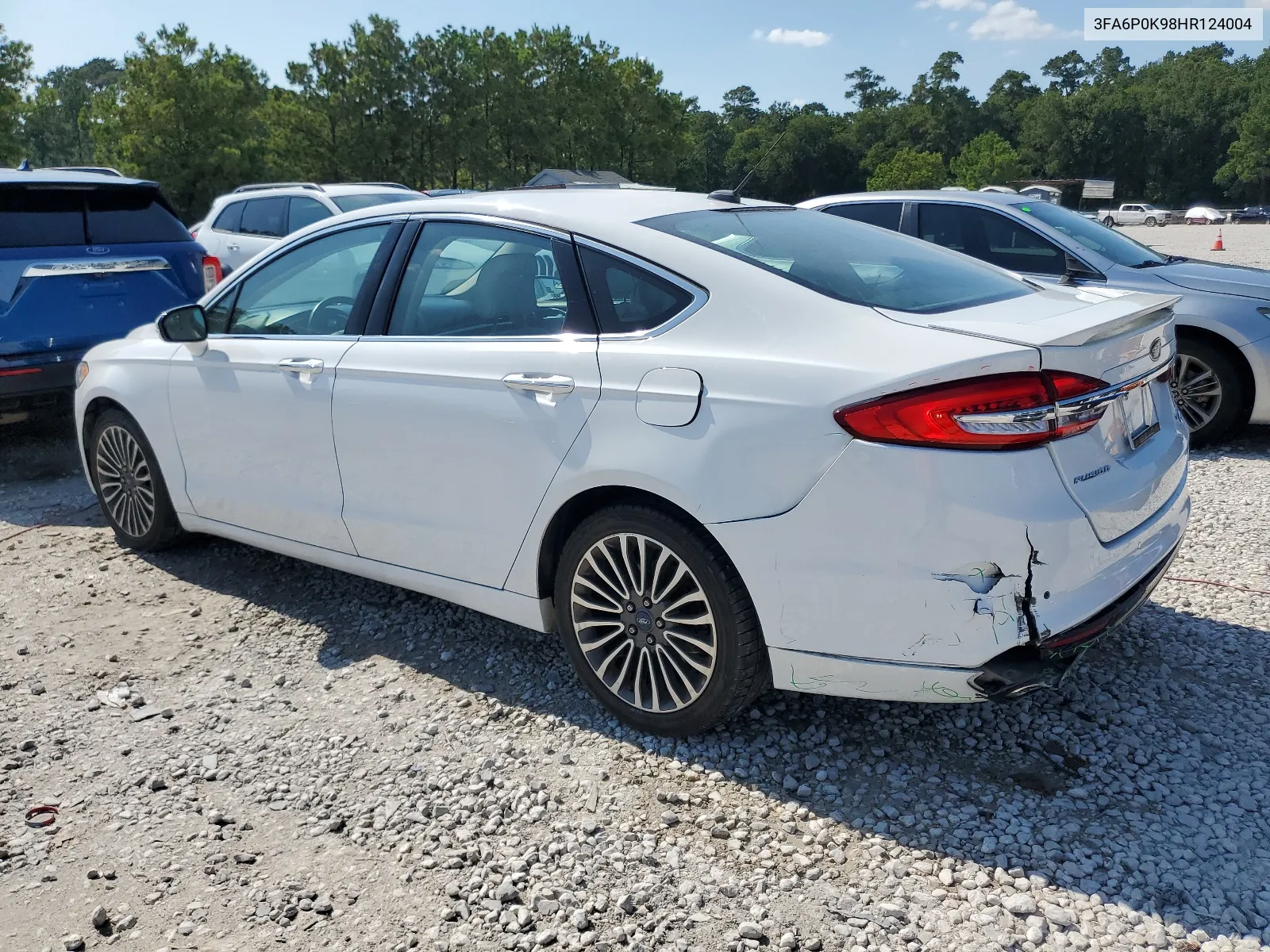 2017 Ford Fusion Titanium VIN: 3FA6P0K98HR124004 Lot: 58225554