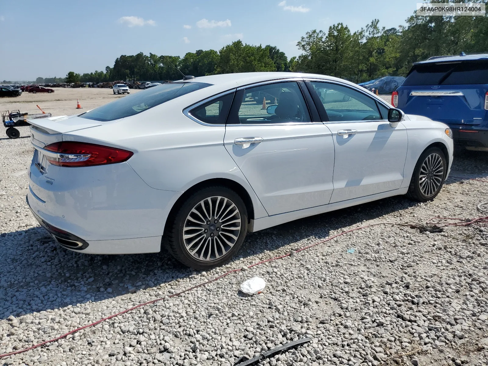 2017 Ford Fusion Titanium VIN: 3FA6P0K98HR124004 Lot: 58225554