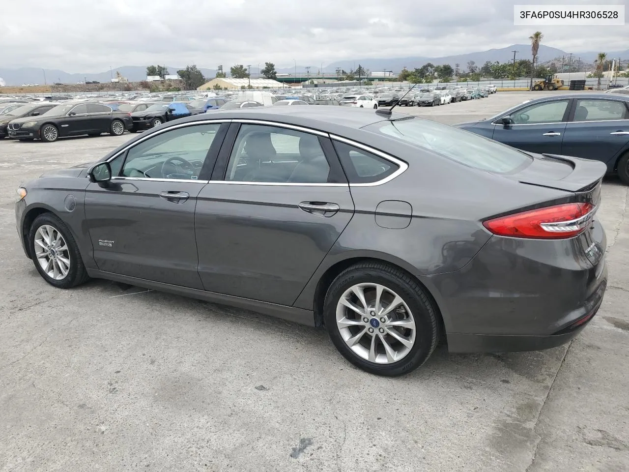 2017 Ford Fusion Titanium Phev VIN: 3FA6P0SU4HR306528 Lot: 72190174