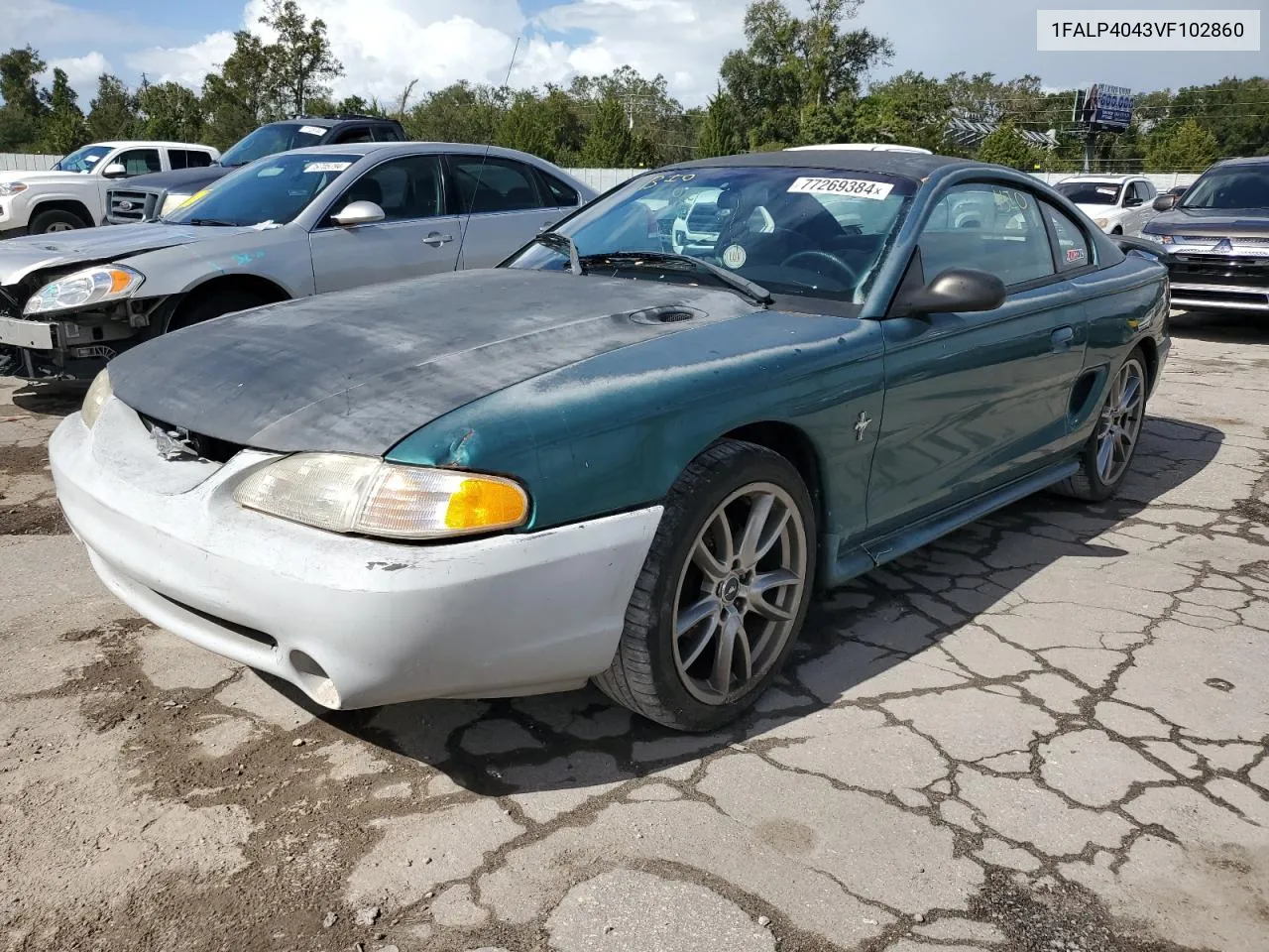 1997 Ford Mustang VIN: 1FALP4043VF102860 Lot: 77269384