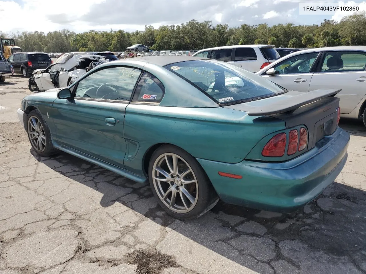 1997 Ford Mustang VIN: 1FALP4043VF102860 Lot: 77269384