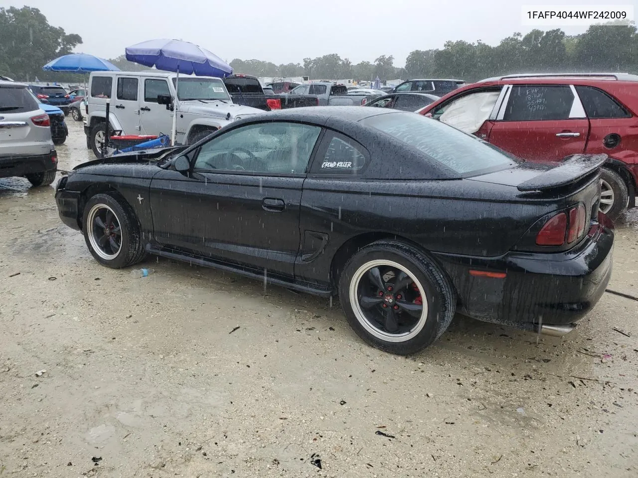 1998 Ford Mustang VIN: 1FAFP4044WF242009 Lot: 70976044