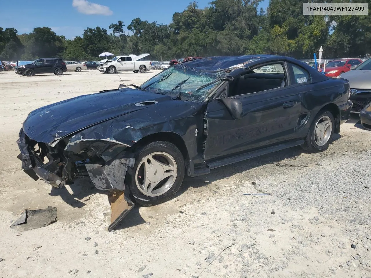 1998 Ford Mustang VIN: 1FAFP4049WF127499 Lot: 72852704