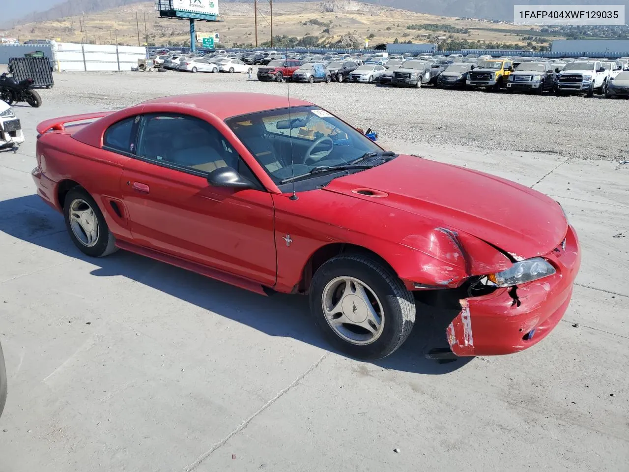 1998 Ford Mustang VIN: 1FAFP404XWF129035 Lot: 74871594