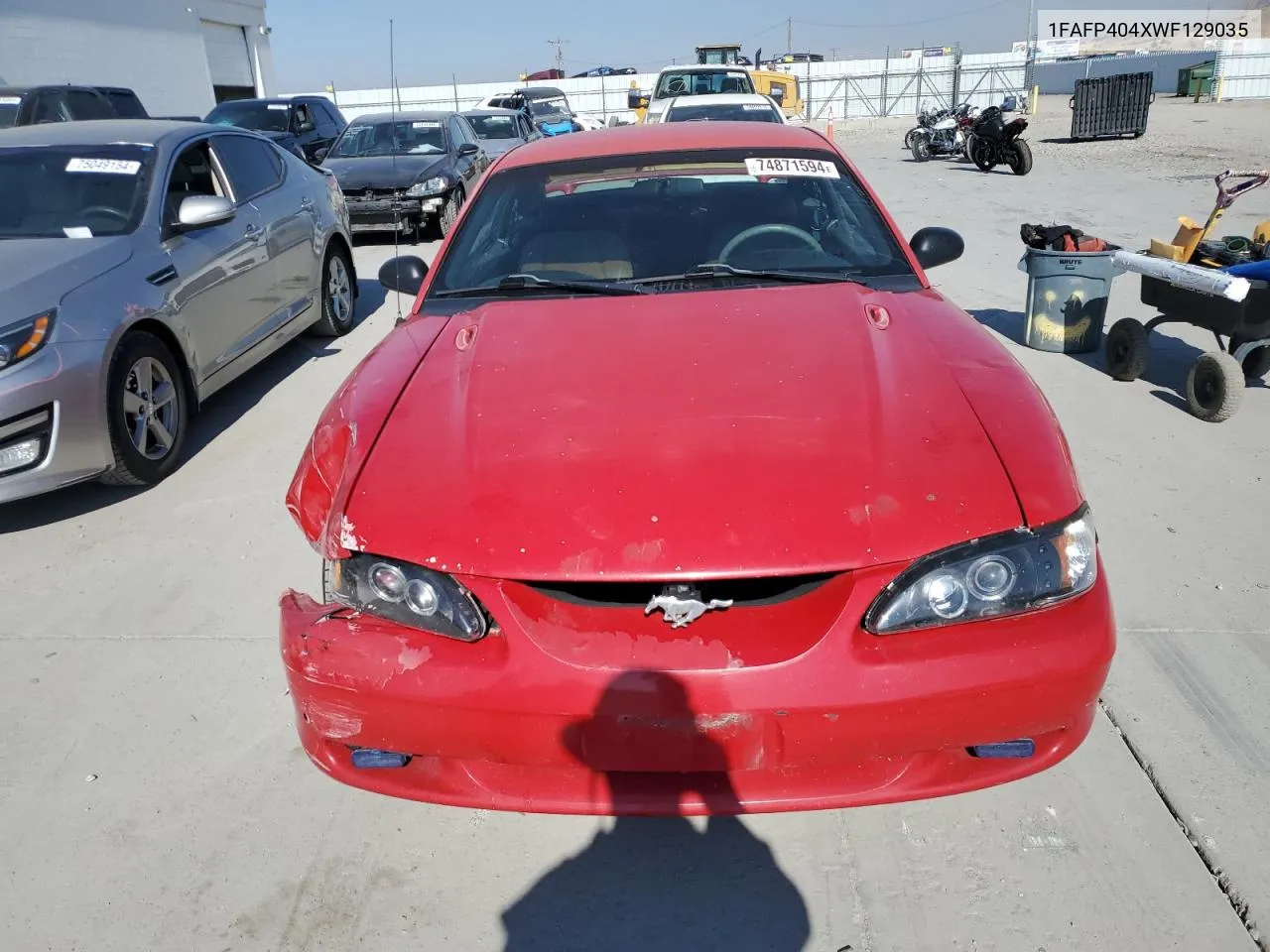 1998 Ford Mustang VIN: 1FAFP404XWF129035 Lot: 74871594