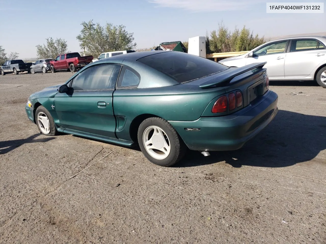 1998 Ford Mustang VIN: 1FAFP4040WF131232 Lot: 76300014