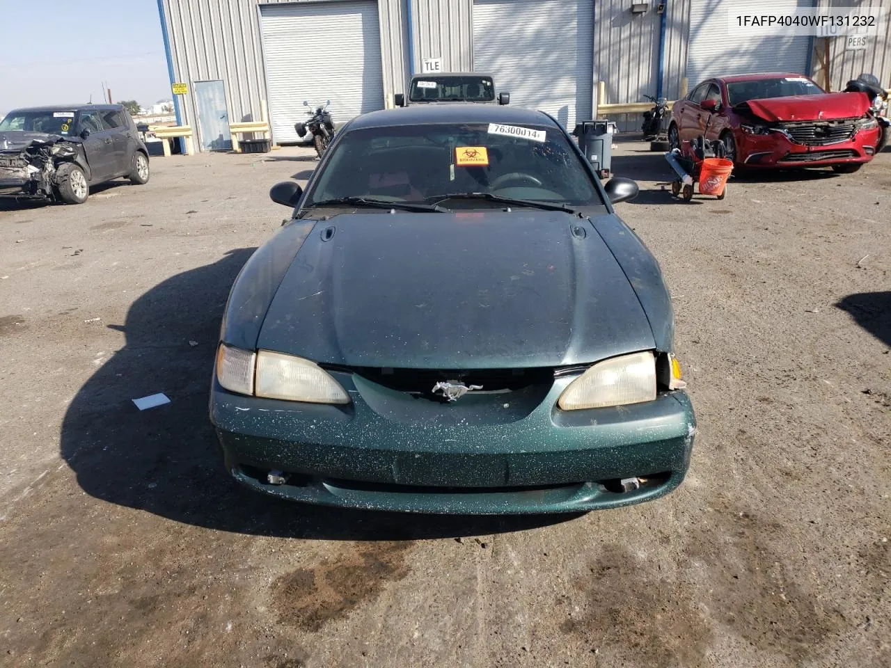 1998 Ford Mustang VIN: 1FAFP4040WF131232 Lot: 76300014