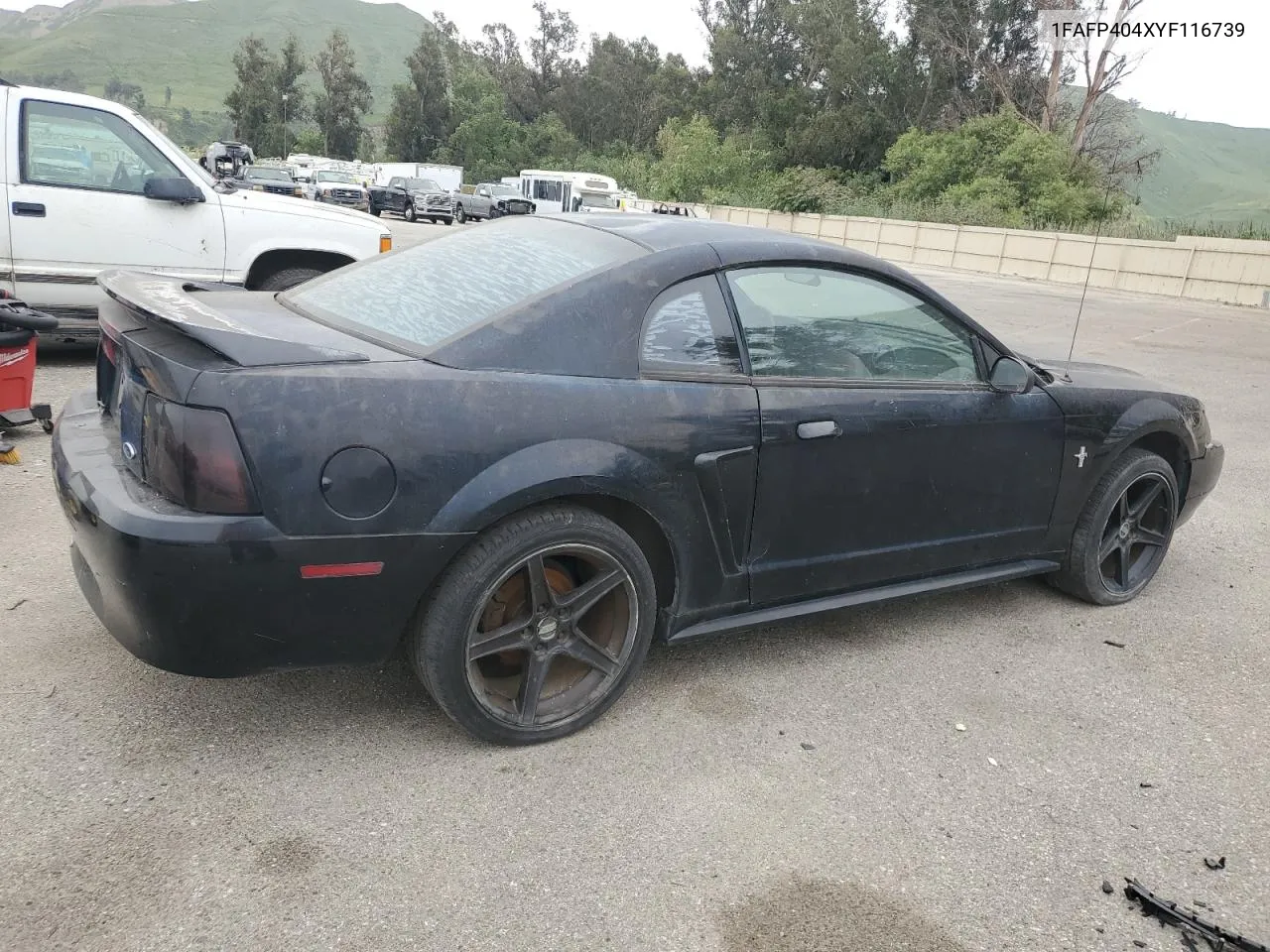 2000 Ford Mustang VIN: 1FAFP404XYF116739 Lot: 56438294