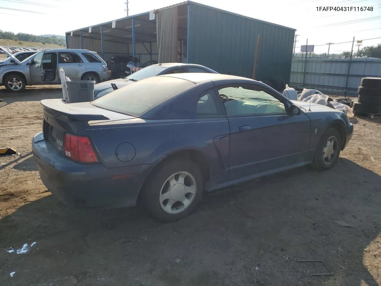 2001 Ford Mustang VIN: 1FAFP40431F116748 Lot: 74848894