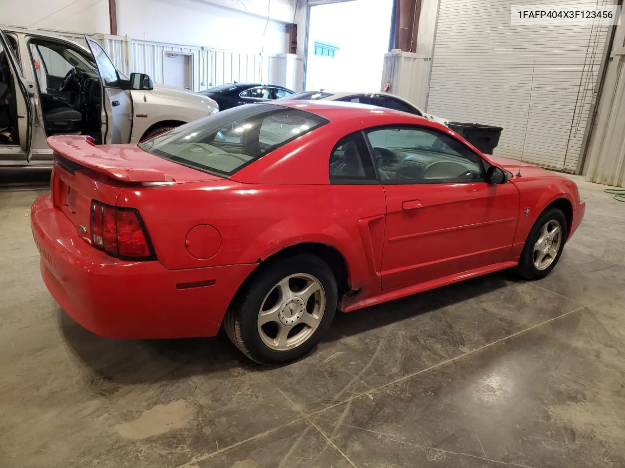 2003 Ford Mustang VIN: 1FAFP404X3F123456 Lot: 76206524