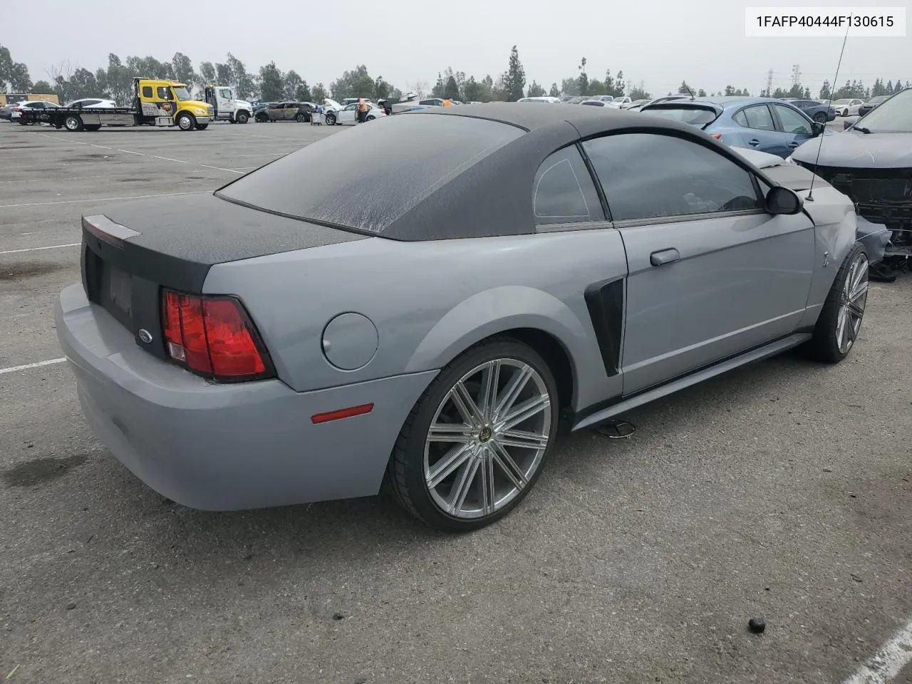 2004 Ford Mustang VIN: 1FAFP40444F130615 Lot: 75952034