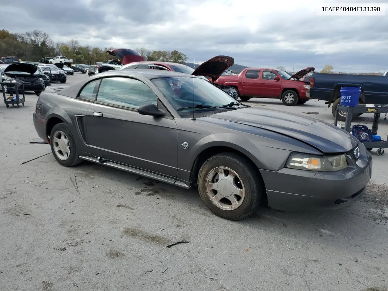 2004 Ford Mustang VIN: 1FAFP40404F131390 Lot: 77065334