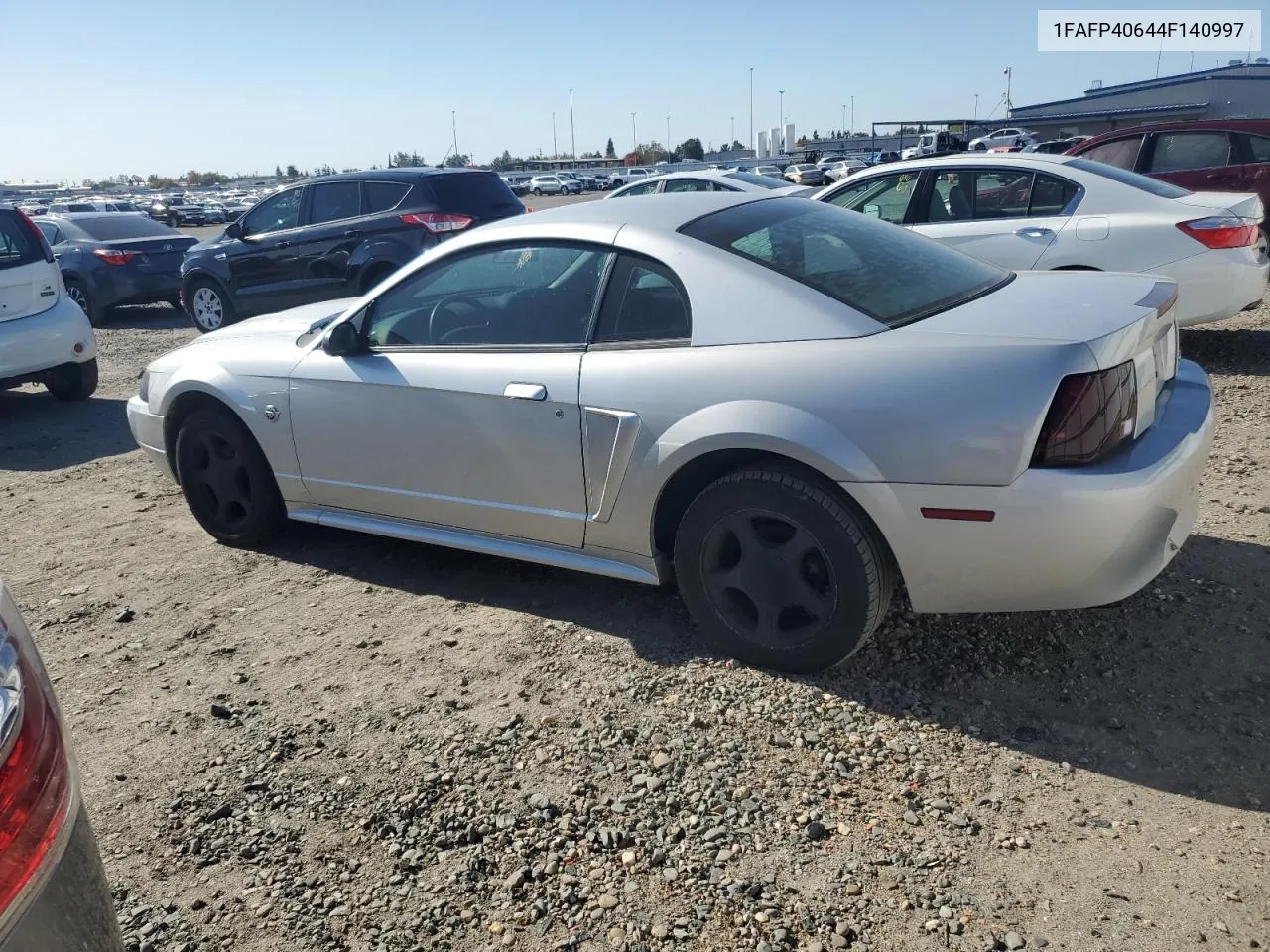 2004 Ford Mustang VIN: 1FAFP40644F140997 Lot: 79357774