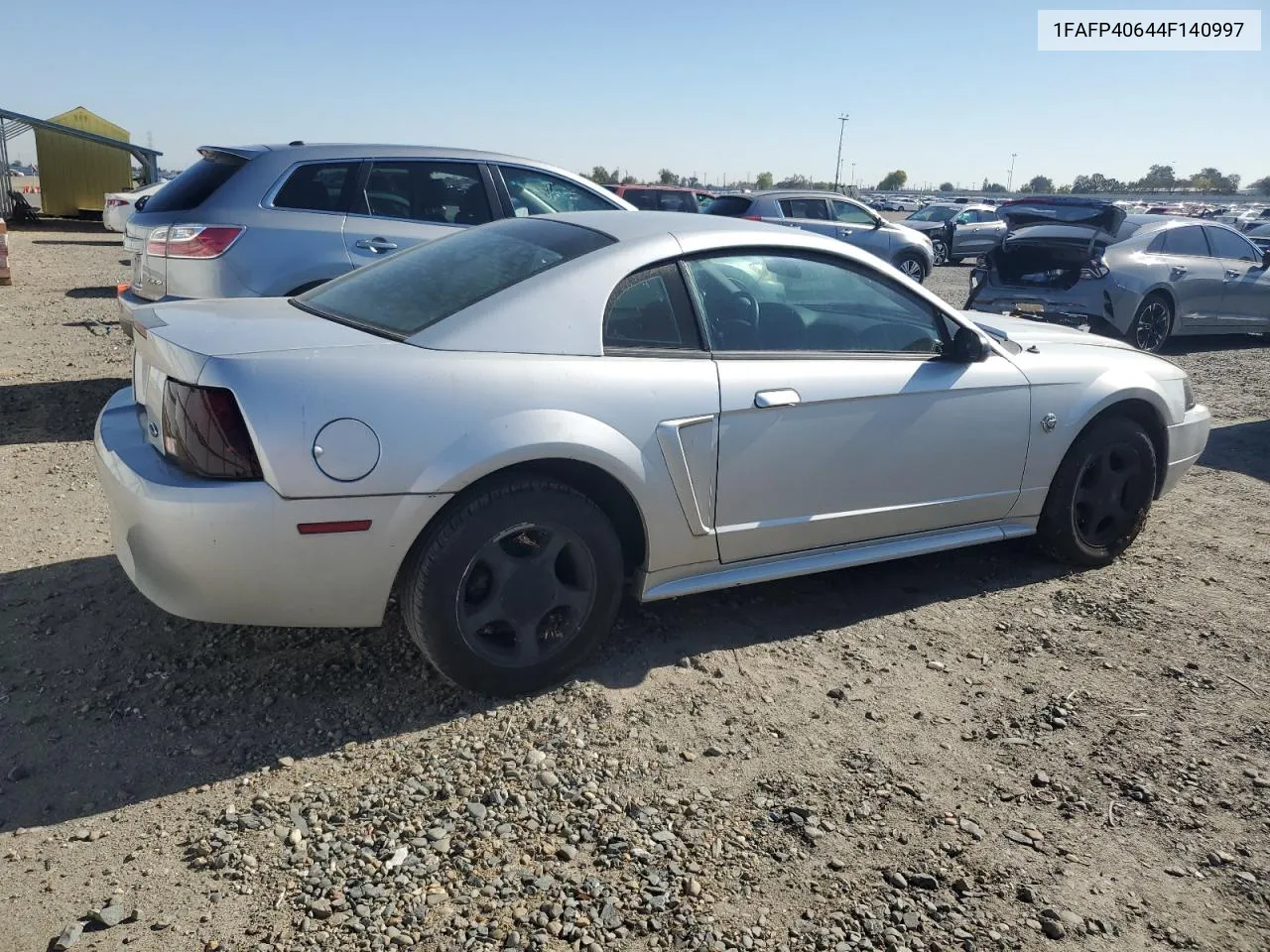 2004 Ford Mustang VIN: 1FAFP40644F140997 Lot: 79357774