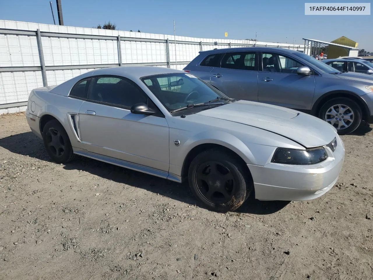 2004 Ford Mustang VIN: 1FAFP40644F140997 Lot: 79357774