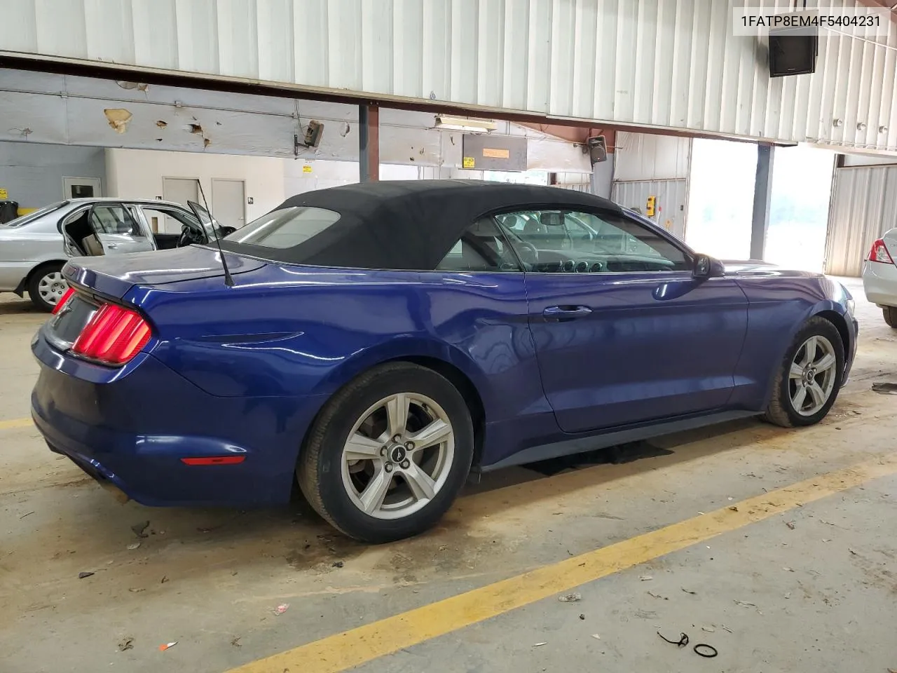 2015 Ford Mustang VIN: 1FATP8EM4F5404231 Lot: 69806944