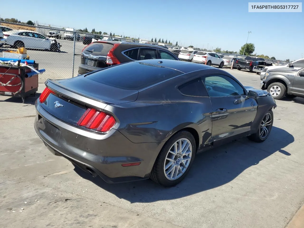 2016 Ford Mustang VIN: 1FA6P8TH8G5317727 Lot: 74326614