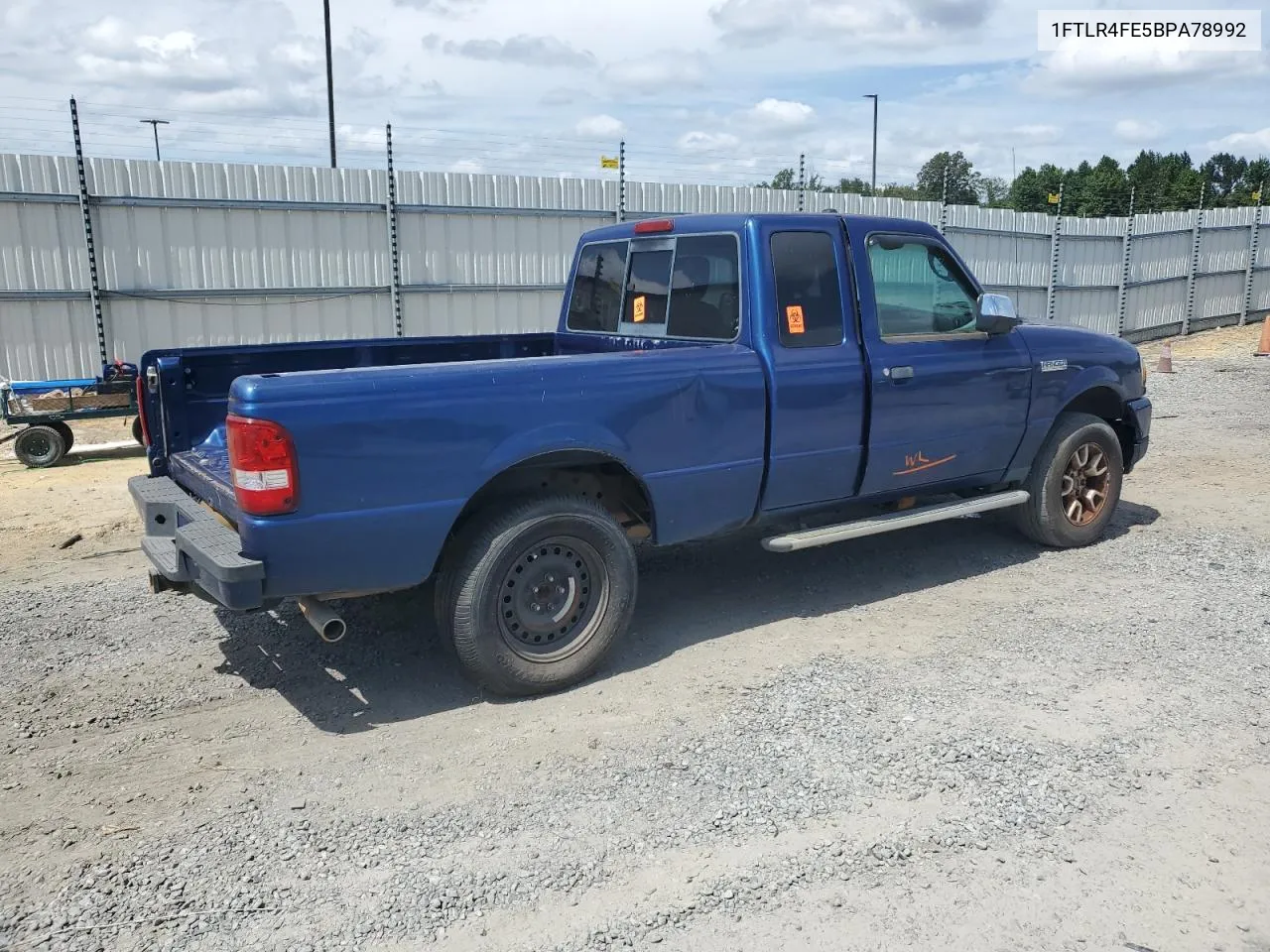 2011 Ford Ranger Super Cab VIN: 1FTLR4FE5BPA78992 Lot: 69661094