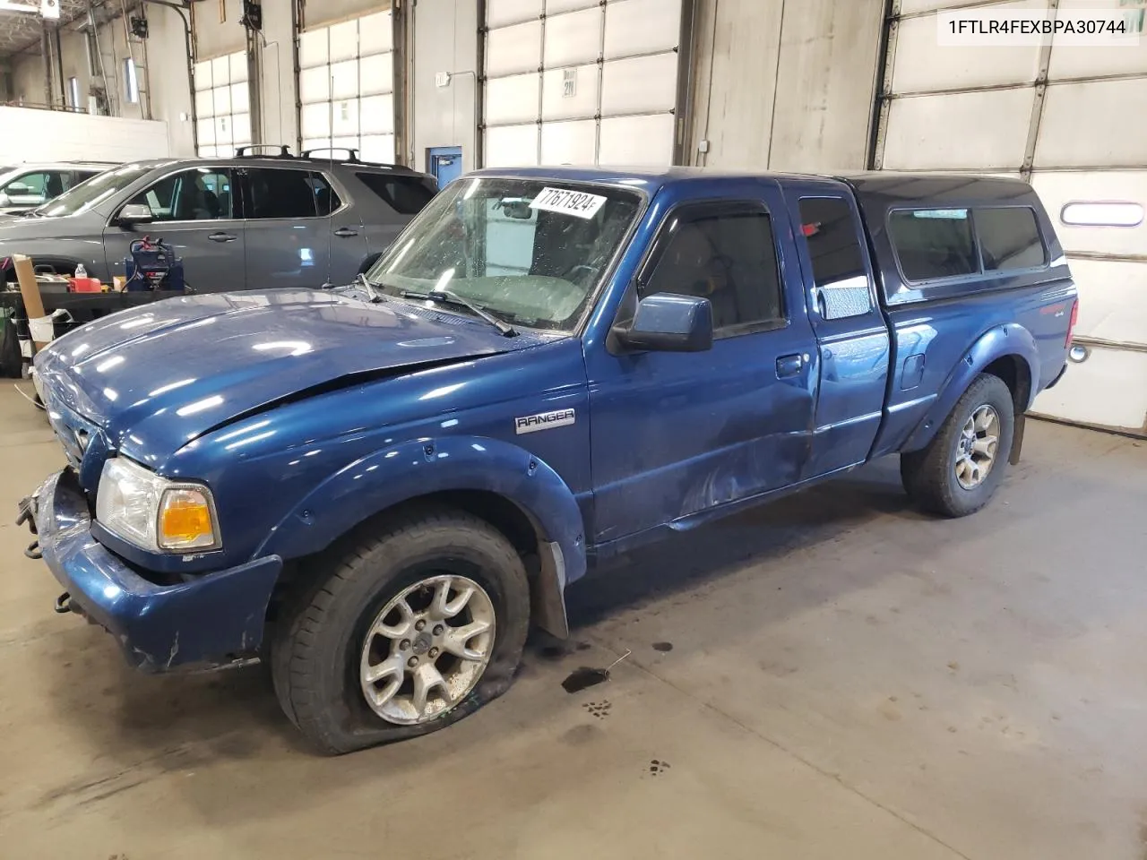 2011 Ford Ranger Super Cab VIN: 1FTLR4FEXBPA30744 Lot: 77671924