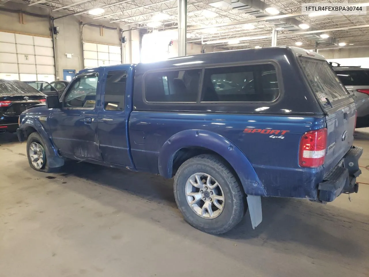 2011 Ford Ranger Super Cab VIN: 1FTLR4FEXBPA30744 Lot: 77671924