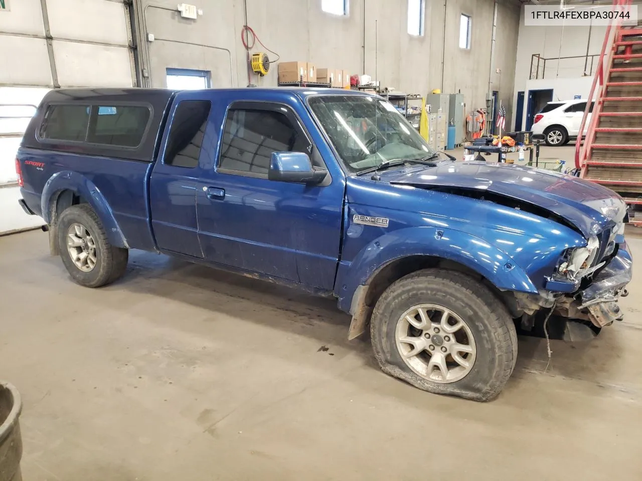 2011 Ford Ranger Super Cab VIN: 1FTLR4FEXBPA30744 Lot: 77671924