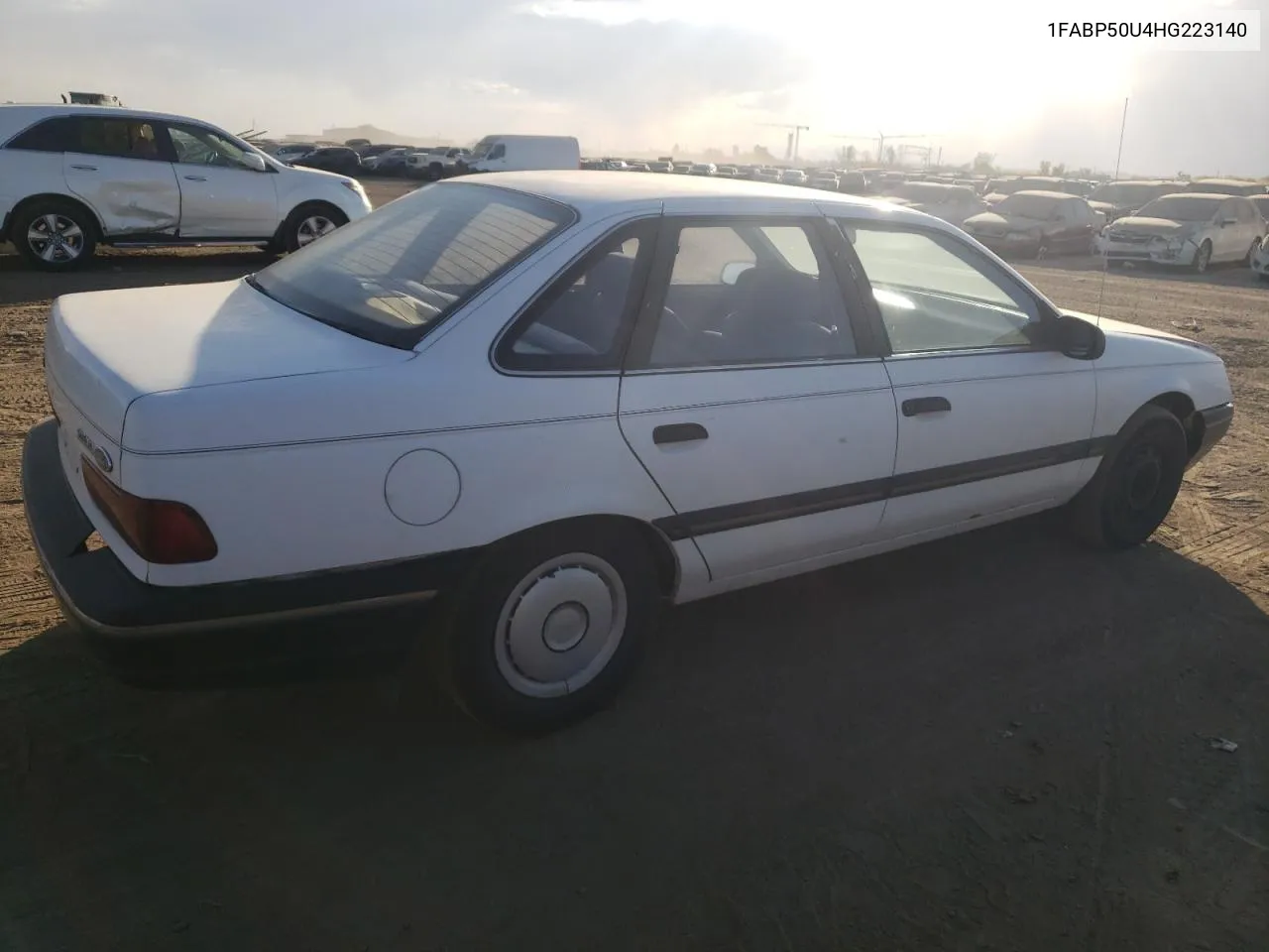 1987 Ford Taurus L VIN: 1FABP50U4HG223140 Lot: 76193014