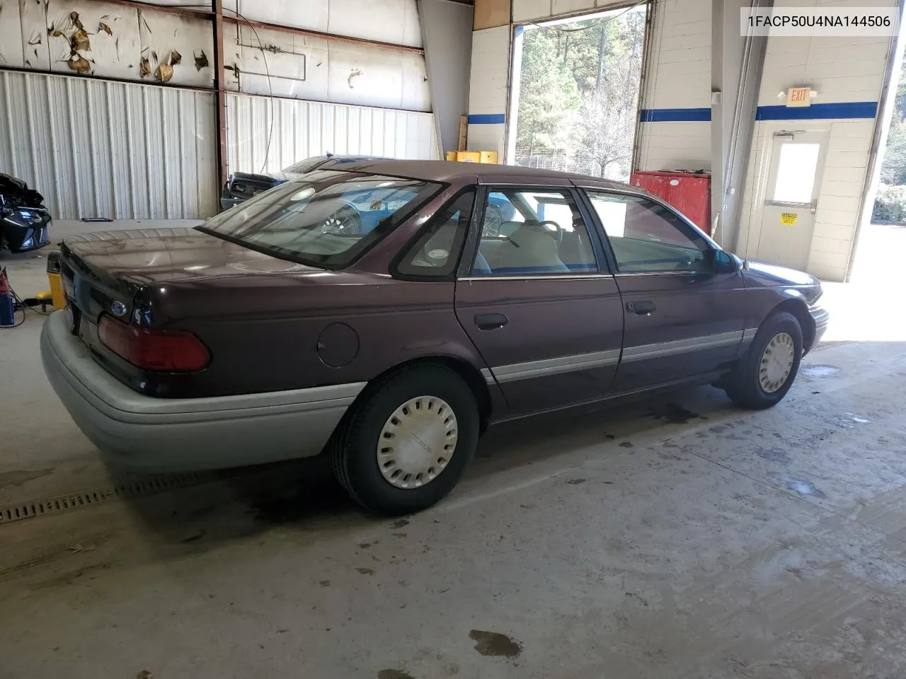 1992 Ford Taurus L VIN: 1FACP50U4NA144506 Lot: 80000064