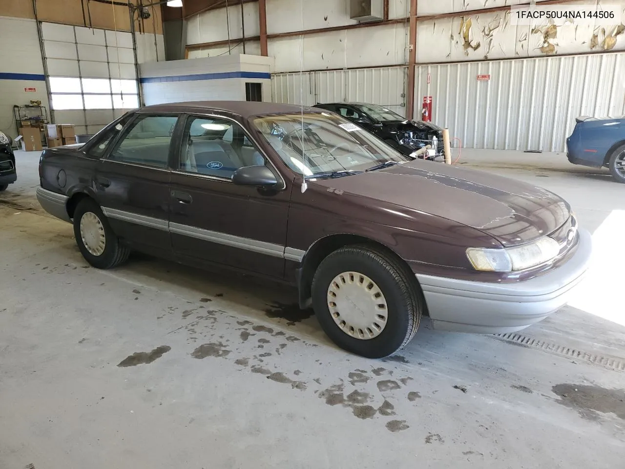 1992 Ford Taurus L VIN: 1FACP50U4NA144506 Lot: 80000064