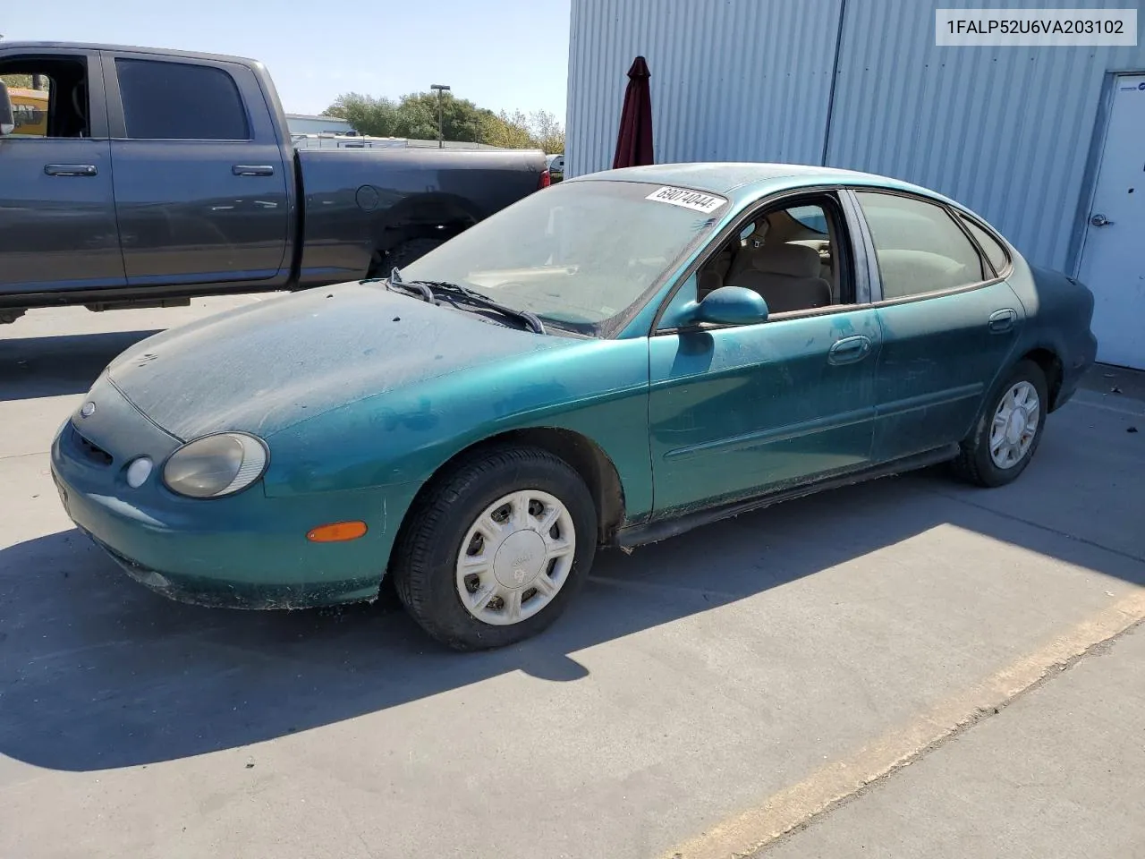 1997 Ford Taurus Gl VIN: 1FALP52U6VA203102 Lot: 69074044