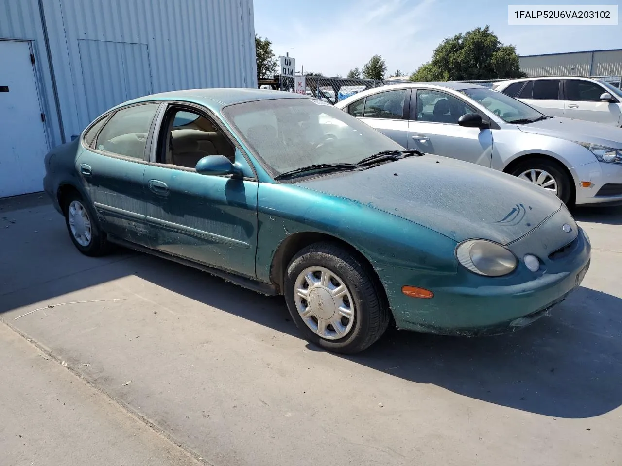 1997 Ford Taurus Gl VIN: 1FALP52U6VA203102 Lot: 69074044